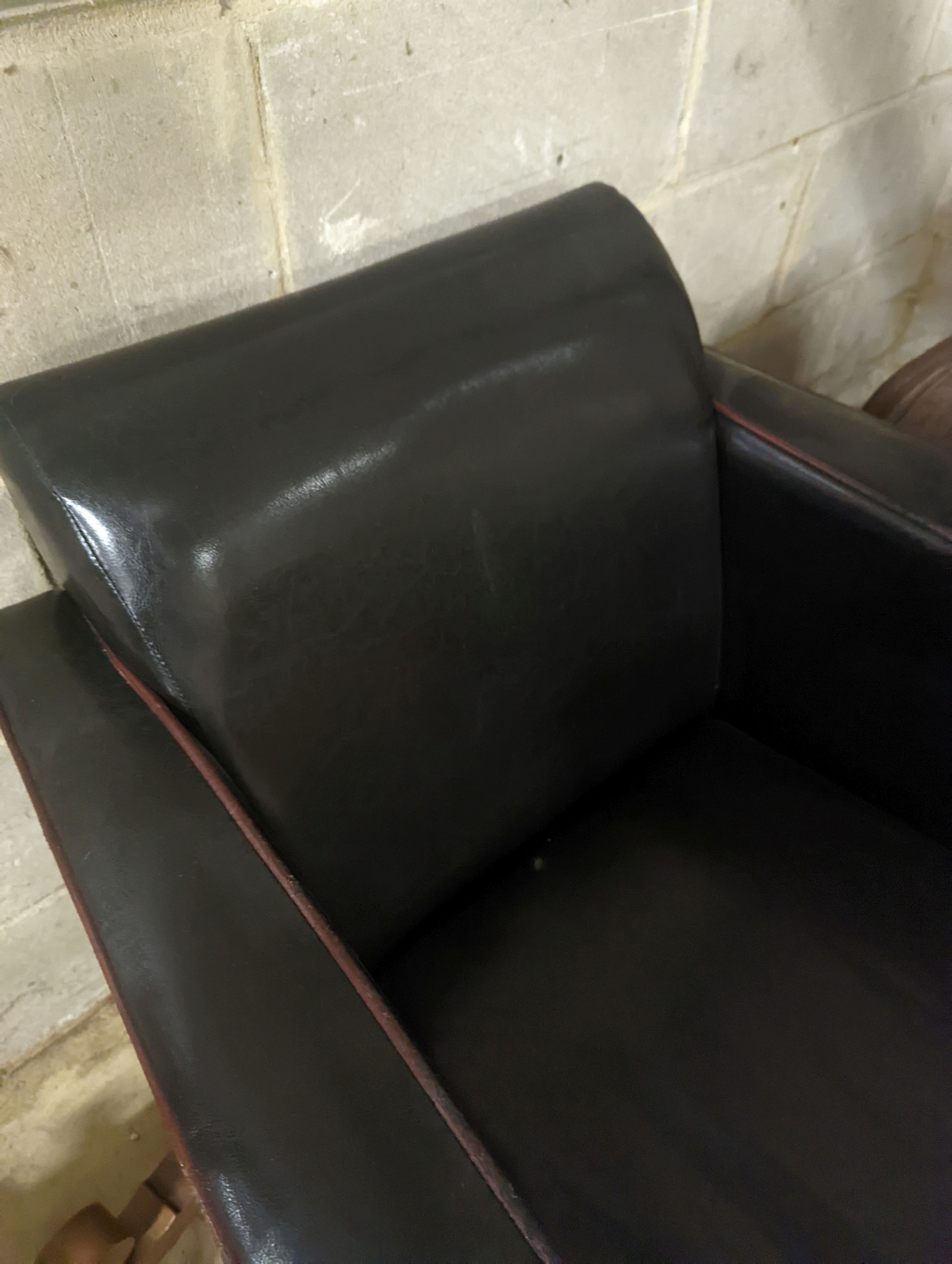 An Art Deco style black leather club chair, width 73cm, depth 80cm, height 78cm